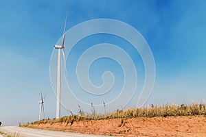 concept idea eco power energy. wind turbine on hill