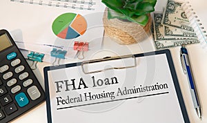Concept image for blog headline or header image. Federal Housing Administration FHA loan inscription on paper