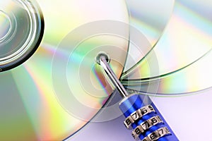 An concept Image of a cd and a lock - data security
