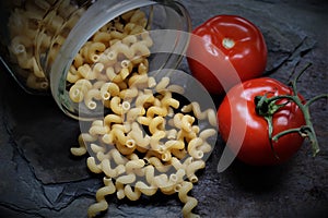 An image of dark past with tomatoes