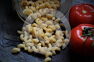 An image of dark past with tomatoes