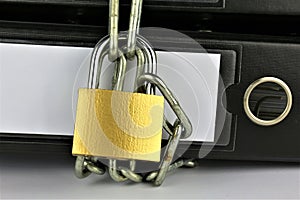 An concept Image of a Folder with chains and a lock