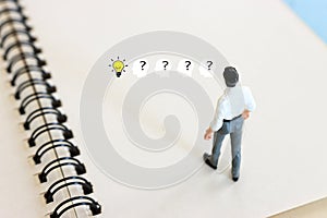 Concept image of man thinking about solving a problem and looking for a right way