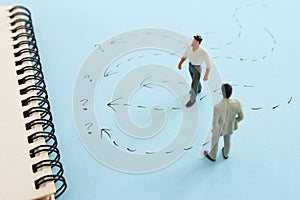 Concept image of people thinking about solving a problem and looking for a right way