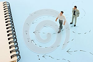 Concept image of people thinking about solving a problem and looking for a right way