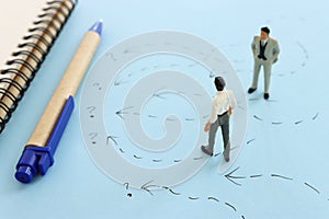 Concept image of people thinking about solving a problem and looking for a right way