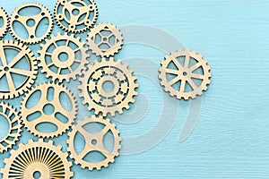 Concept image of placing a cogwheel in set of gears mechanism