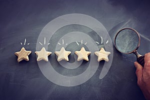 Concept image of setting a five star goal. increase rating or ranking, evaluation and classification idea