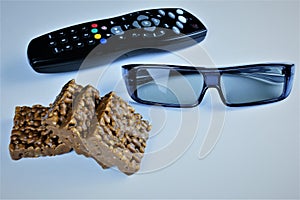 An concept Image of watching televison with 3D glasses and Popcorn, Snack photo