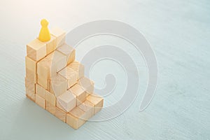 concept image of wood blocks stacking as chart or ladder. concept for growth and success.