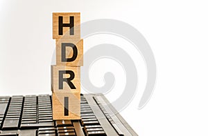 Concept image a wooden block and word - HDRI - High Dynamic Range Imaging on white background photo