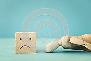 Concept image of wooden dummy with worried stressed thoughts. depression, obsessive compulsive, adhd, anxiety disorders concept