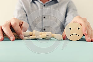 Concept image of wooden dummy with worried stressed thoughts. depression, obsessive compulsive, adhd, anxiety disorders concept