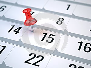 Concept of important day, reminder, organizing time and schedule - red pin marking important day on a calendar photo