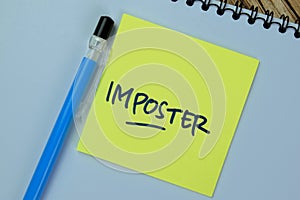 Concept of Imposter write on sticky notes isolated on Wooden Table