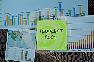 Concept of Indirect Cost write on sticky notes isolated on Wooden Table