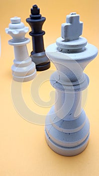 concept of infidelity in chess pieces, chess game, plastic chess pieces, infidelity of the queen, king and queen