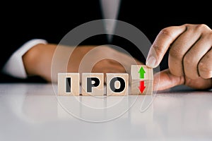 The concept of initial public offerings, IPO text on a wooden block
