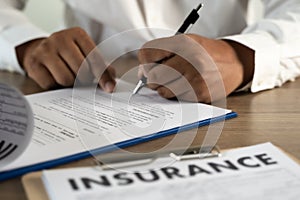 Concept of insurance man protective and car  family  health insurance  policy examining