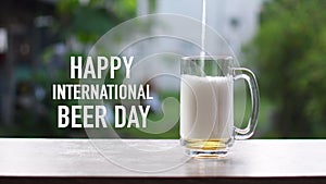 Concept, International Beer Day IBD is a celebration on the first Friday of every August founded in 2007. Pour beer into a glass
