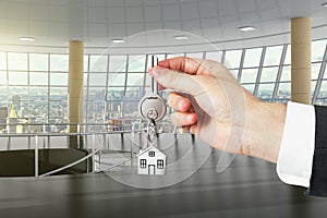 Concept of the keys to new large office with city view