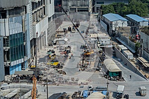 Concept of laborers working on modern construction site