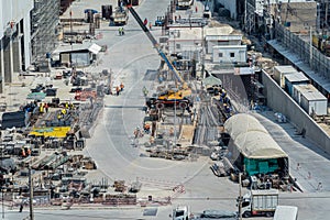 Concept of laborers working on modern construction site