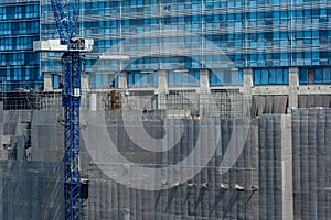 Concept of laborers working on modern construction site