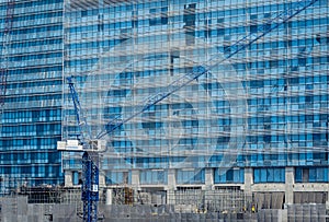 Concept of laborers working on modern construction site