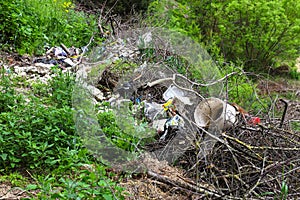 The concept of landfills  piles of garbage  landfills in nature  barbaric attitude to the environment.