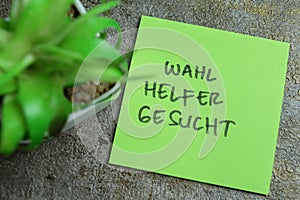 Concept of Learning language - German. Wahl Helfer Gesucht it means Election helper wanted written on sticky notes. German
