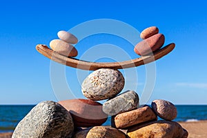 Concept of life balance and harmony. Balance stones against the sea