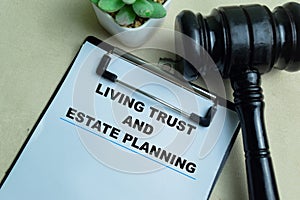 Concept of Living Trust and Estate Planning write on paperwork isolated on wooden background