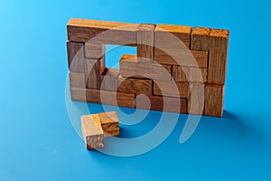 Geometric wooden blocks on blue nacground