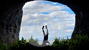 The concept of the man in the handstand position in the historical cave and the lifestyle in nature