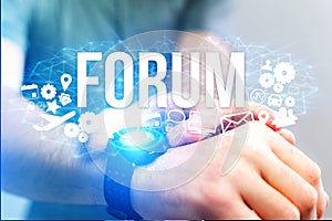 Concept of man holding futuristic interface with forum title and