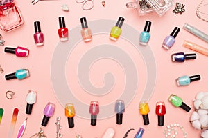 Concept, manicure with nail polish, pedicure on pink background, copy space