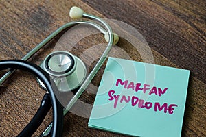 Concept of Marfan Syndrome write on sticky notes with stethoscope isolated on white background