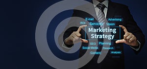 Marketing Strategy text in digital format with Business person photo