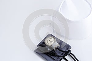 Concept for medicine. Medical items medical cap, tonometer, stethoscope on a white isolated background.