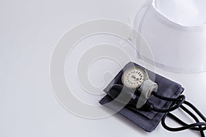 Concept for medicine. Medical items medical cap, tonometer, stethoscope on a white isolated background.