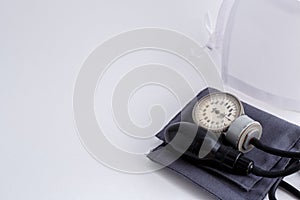 Concept for medicine. Medical items medical cap, tonometer, stethoscope on a white isolated background.