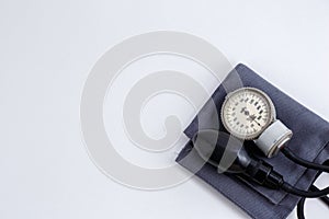 Concept for medicine. Medical items medical cap, tonometer, stethoscope on a white isolated background.