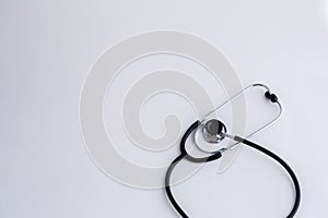 Concept for medicine. Medical items medical cap, tonometer, stethoscope on a white isolated background.