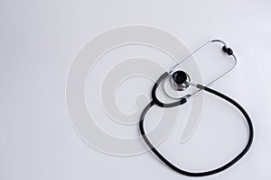 Concept for medicine. Medical items medical cap, tonometer, stethoscope on a white isolated background.