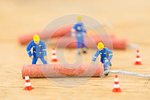 Concept miniature people working on Firecracker