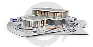 Concept of modern cottage located on blueprints, photo
