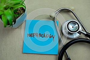 Concept of Nephrology write on sticky notes isolated on Wooden Table