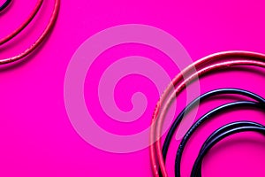 Concept network internet cable on pink background close up