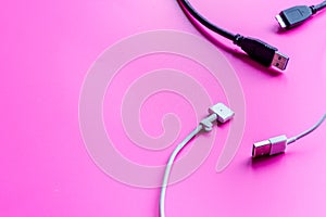 Concept network internet cable on pink background close up